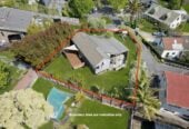 The homeowner will provide RC and EPA for 3 new houses prior to settlement, 26 Orinda Close, Botany Downs, Auckland