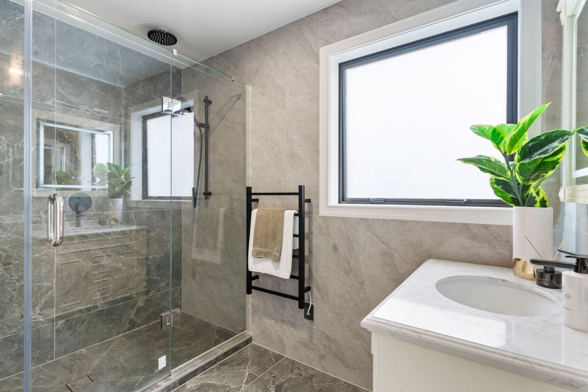 Must sell, Ignore CV of $3.5M,, Enquires Over $2,500,000, 294m2 4 beds 4.5 bath house with double garage on 471m2 section, Westmere School is at your doorstep, Western Springs College, the zoo, and lakeside park are a short stroll away, while Cox’s Bay Reserve, boutique cafes, and the CBD remain within easy reach, 48A Garnet Road, Westmere, Auckland
