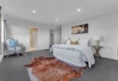 Zoned for excellent local schools, and Ormiston Shopping Centre nearby, 32 Castlederg Drive, Flat Bush, Auckland