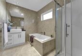 Zoned for excellent local schools, and Ormiston Shopping Centre nearby, 32 Castlederg Drive, Flat Bush, Auckland