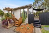 Light, Split-Level Living Made Easy, single garage plus a huge storage/workshop area, 5A Morriggia Place, Bayview, Auckland