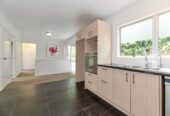 3 bedrooms house on 703m² land, Downstairs with separate entrances a huge rumpus room, 3 additional rooms, and a bathroom, 29 Santiago Crescent, Unsworth Heights, Auckland