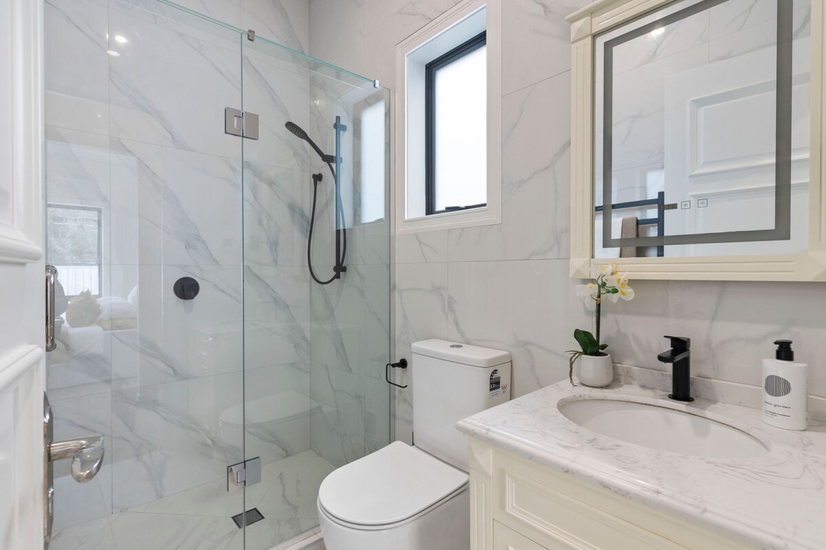 Must sell, Ignore CV of $3.5M,, Enquires Over $2,500,000, 294m2 4 beds 4.5 bath house with double garage on 471m2 section, Westmere School is at your doorstep, Western Springs College, the zoo, and lakeside park are a short stroll away, while Cox’s Bay Reserve, boutique cafes, and the CBD remain within easy reach, 48A Garnet Road, Westmere, Auckland