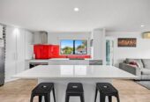 Move-in ready, 3 bedrooms home plus moveable sleepout, freestanding outdoor fireplace, short drive to Albany Mall, 1/77 Santiago Crescent, Unsworth Heights, Auckland