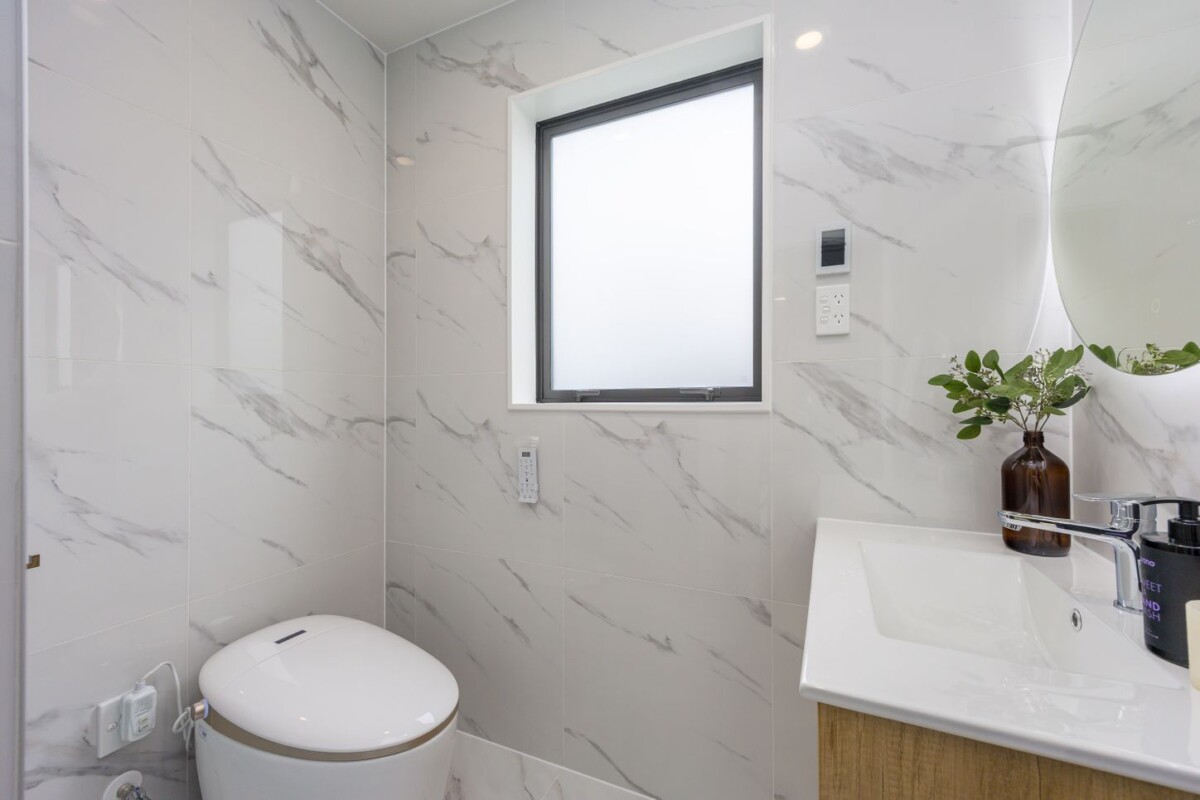 Just minutes from Westgate Shopping Centre and Costco, 3/6 Woodhouse Place, West Harbour, Auckland