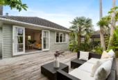 Living area polished native Rimu floors, downstairs basement area for storage, 3 beds home, minutes to Glenfield Mall, 1/18 Roberts Road, Glenfield, Auckland