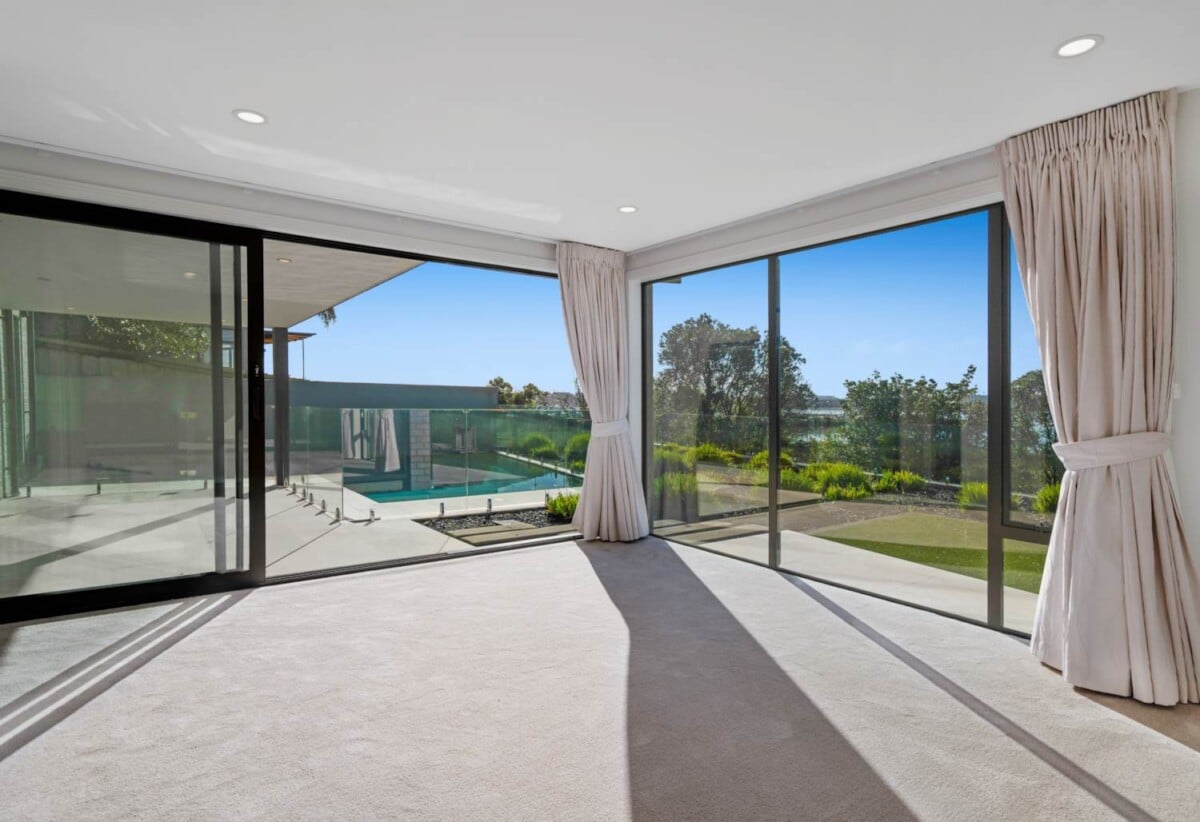 5 beds 5.5 baths house on 707m² section, Panoramic Seaview, a triple garage and a private heated pool, Constructed from polished concrete blocks and aluminum, 66 Seacrest Drive, West Harbour, Auckland