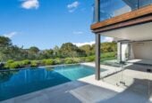 5 beds 5.5 baths house on 707m² section, Panoramic Seaview, a triple garage and a private heated pool, Constructed from polished concrete blocks and aluminum, 66 Seacrest Drive, West Harbour, Auckland