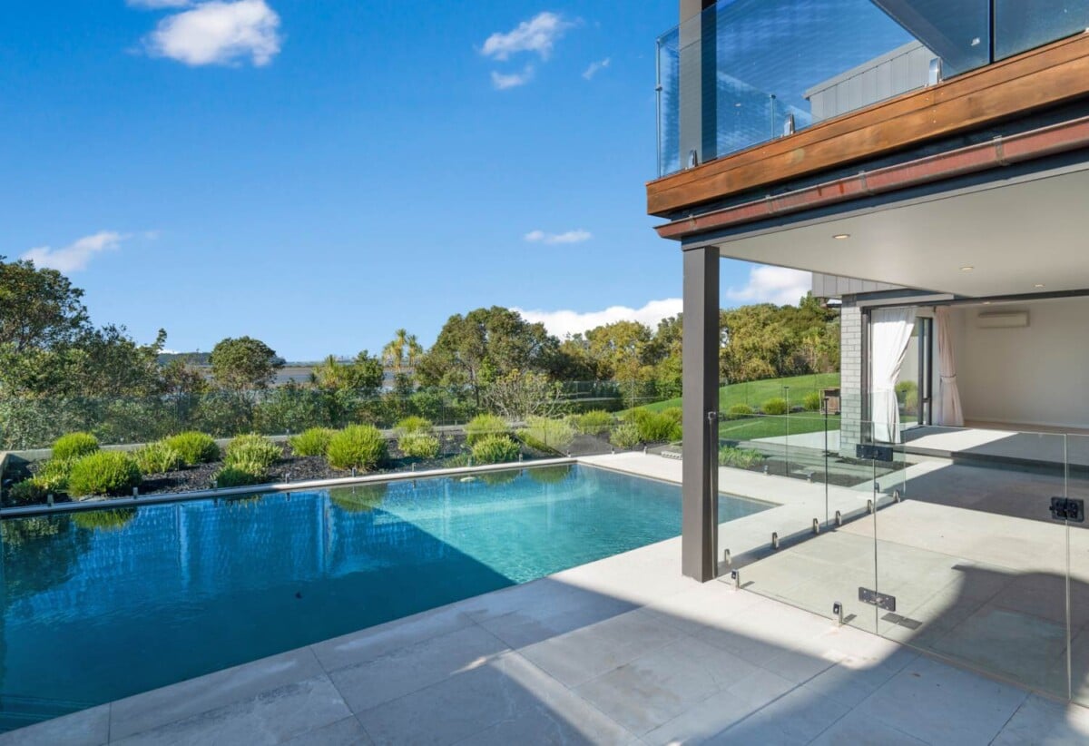 5 beds 5.5 baths house on 707m² section, Panoramic Seaview, a triple garage and a private heated pool, Constructed from polished concrete blocks and aluminum, 66 Seacrest Drive, West Harbour, Auckland
