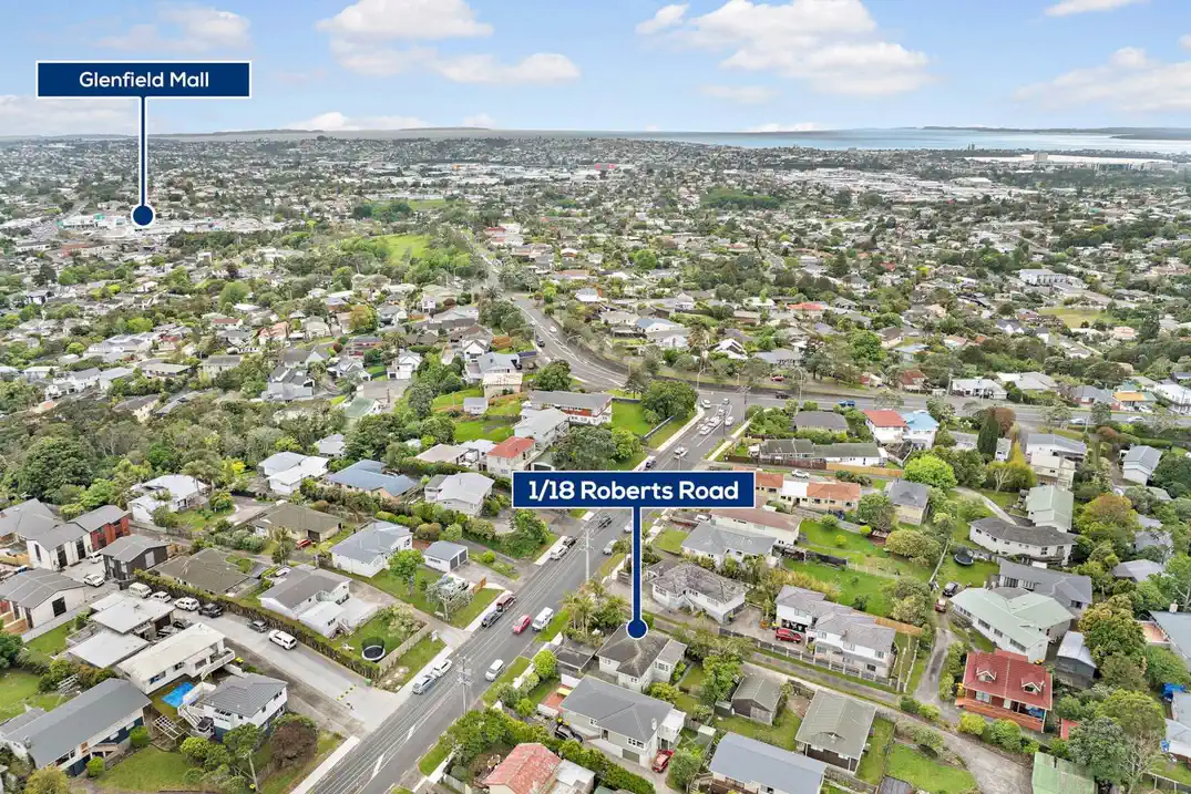 Living area polished native Rimu floors, downstairs basement area for storage, 3 beds home, minutes to Glenfield Mall, 1/18 Roberts Road, Glenfield, Auckland