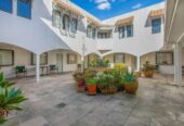 2 beds 1 bath apartment with garage, close to supermarkets, the post office, train station, 4/77 St George Street, Papatoetoe, Auckland