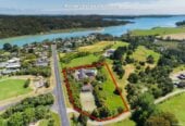 Vendor purchased elsewhere, committed selling, 436m²  Brick 5 beds + office, 4.5 bath house on 8001m² land, including 1 bed 1bath guest suite, Full-sized tennis court, pool, minutes to Albany Mall and Long Bay Village & beaches, 70 Okura River Road, Okura, Auckland