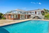 Vendor purchased elsewhere, committed selling, 436m²  Brick 5 beds + office, 4.5 bath house on 8001m² land, including 1 bed 1bath guest suite, Full-sized tennis court, pool, minutes to Albany Mall and Long Bay Village & beaches, 70 Okura River Road, Okura, Auckland