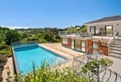 Vendor purchased elsewhere, committed selling, 436m²  Brick 5 beds + office, 4.5 bath house on 8001m² land, including 1 bed 1bath guest suite, Full-sized tennis court, pool, minutes to Albany Mall and Long Bay Village & beaches, 70 Okura River Road, Okura, Auckland