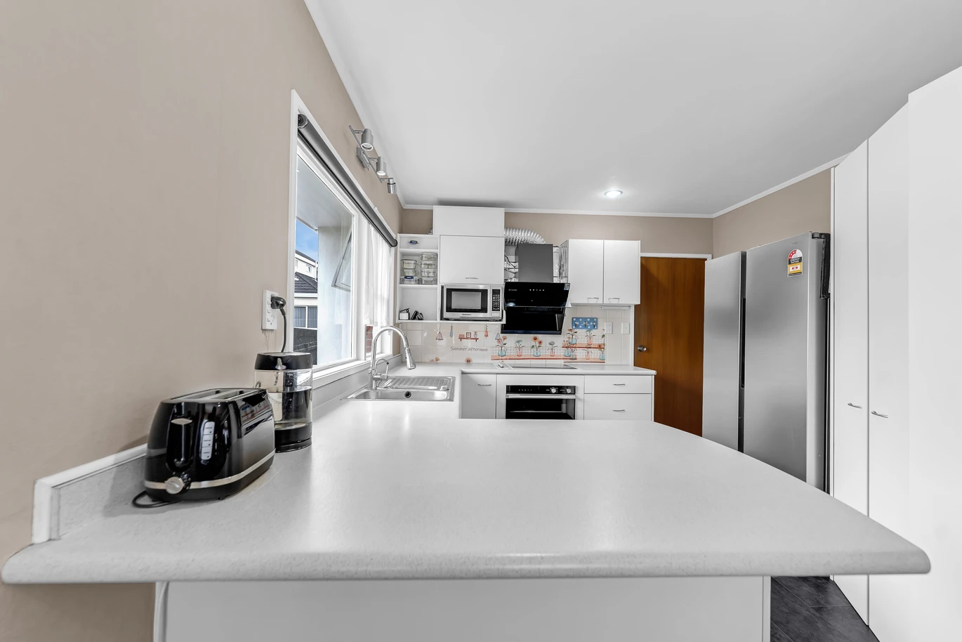 Brick and tile 3 beds 3 baths home, Plus – a self-contained area with its own entrance, featuring a sitting room, study, bathroom, Rumpus, 1/59 Glenmore Road, Sunnyhills, Auckland