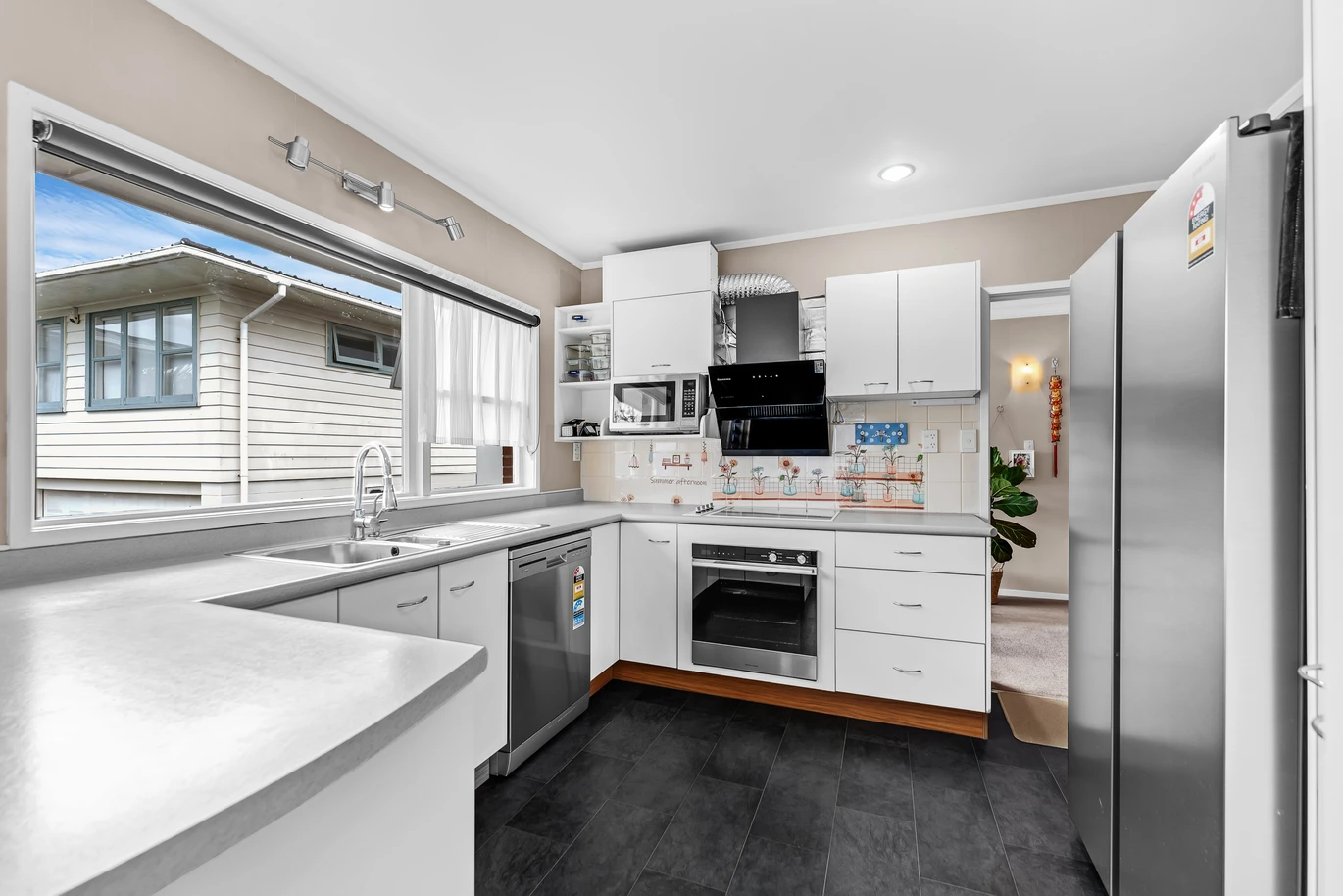 Brick and tile 3 beds 3 baths home, Plus – a self-contained area with its own entrance, featuring a sitting room, study, bathroom, Rumpus, 1/59 Glenmore Road, Sunnyhills, Auckland