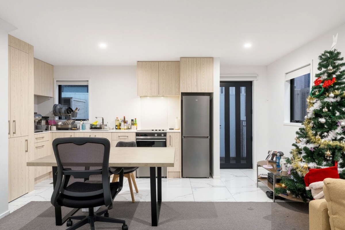 Built by Williams Corporation, 2 beds 1 bath home with a fenced yard on 112m2 section, 1/21 Karamu Street, Te Atatu Peninsula, Auckland