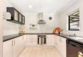 Owners relocating, the sale must be swift, 153m2 affordable 4 beds 1.5 baths house with garage on 256m2 section, 14 Taiaapure Street, Weymouth, Auckland