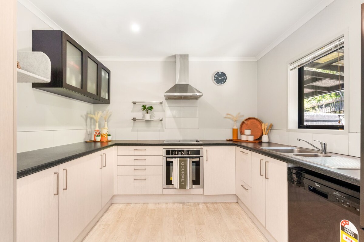 Owners relocating, the sale must be swift, 153m2 affordable 4 beds 1.5 baths house with garage on 256m2 section, 14 Taiaapure Street, Weymouth, Auckland