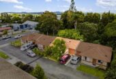 Brick and tile 2 beds 1 bath home with garage, Vacant possession available from 1 August 2027, Government-guaranteed rent of $30,680 per annum, 23/379 Swanson Road, Ranui, Auckland