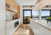 2 beds 2 baths apartment with a big office and double garage, Underfloor heating in both bathrooms , walks to Browns Bay Beach, shops, schools, 05 km to Browns Bay School, 503/32 Anzac Road, Browns Bay, Auckland