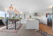 180 degrees sea views, 310m2 4 beds 3 baths house on 750m2 section, a high-stud, oversized rumpus room, a covered built-in spa, new solid weatherboard cladding, new double-glazed windows, and new CCC, 1 km to Hobsonville School, 29 Oakpark Place, West Harbour, Auckland