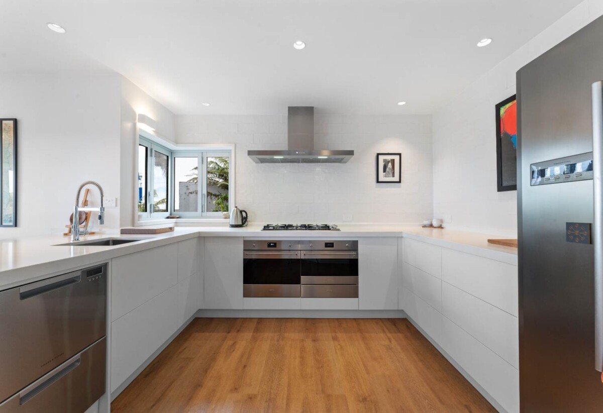 180 degrees sea views, 310m2 4 beds 3 baths house on 750m2 section, a high-stud, oversized rumpus room, a covered built-in spa, new solid weatherboard cladding, new double-glazed windows, and new CCC, 1 km to Hobsonville School, 29 Oakpark Place, West Harbour, Auckland