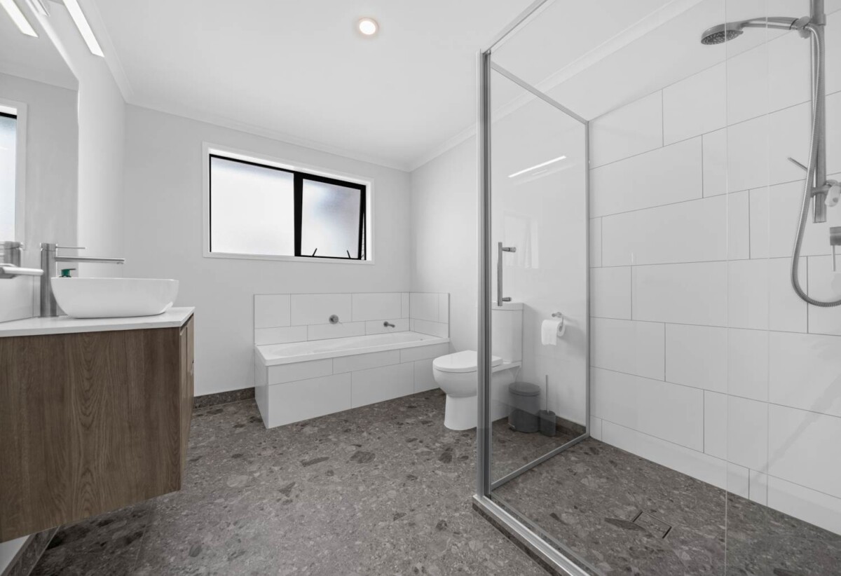Built by renowned builder GJ Gardner, 4 beds 3 baths house with garage on 378m² section, 0.3 km to Mangapikopiko School, 1.4 km to Rosehill Intermediate, 1.6 km to Rosehill College, 5 Emerald Avenue, Rosehill, Auckland