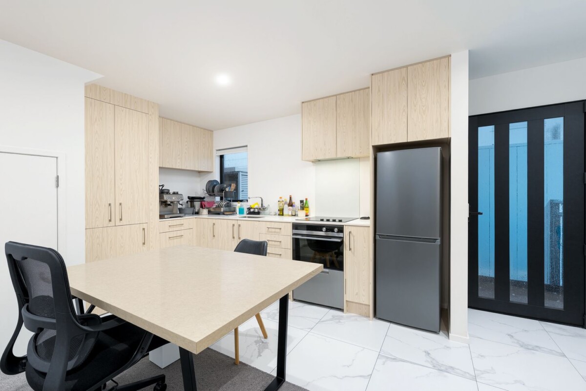 Built by Williams Corporation, 2 beds 1 bath home with a fenced yard on 112m2 section, 1/21 Karamu Street, Te Atatu Peninsula, Auckland