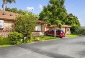Brick and tile 2 beds 1 bath home with garage, Vacant possession available from 1 August 2027, Government-guaranteed rent of $30,680 per annum, 23/379 Swanson Road, Ranui, Auckland