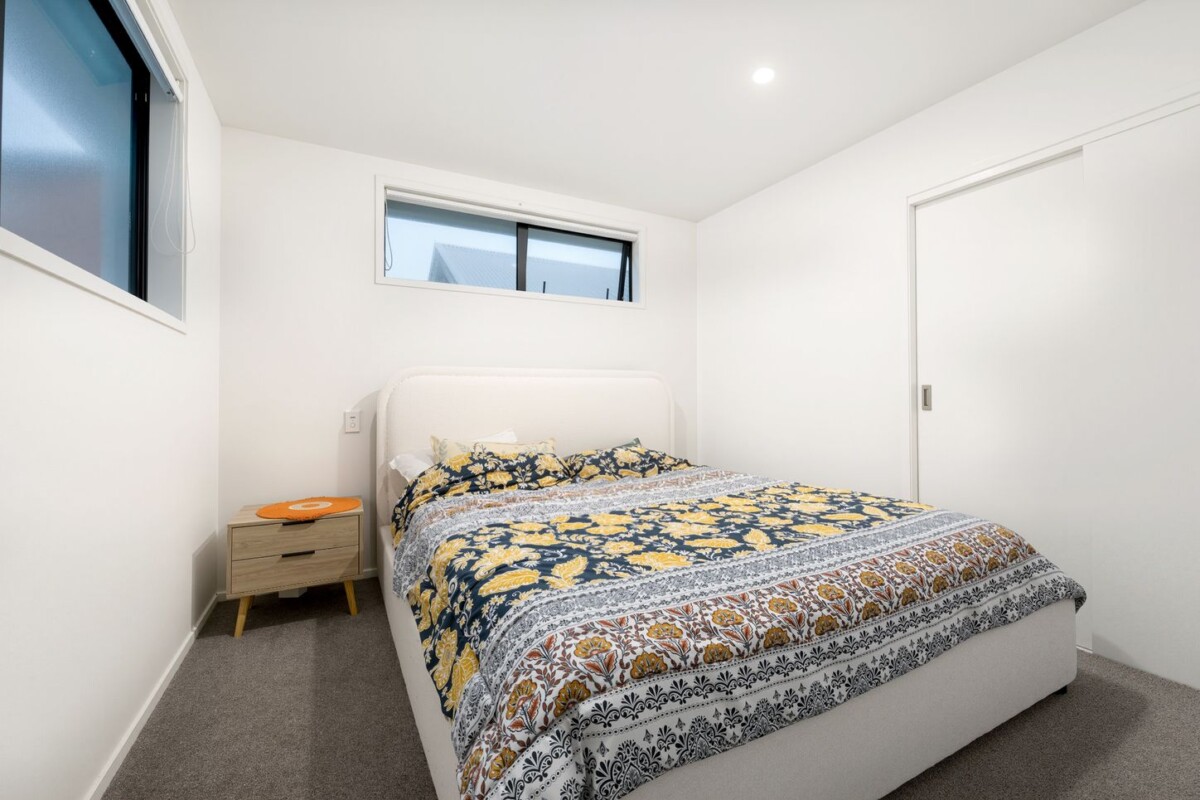 Built by Williams Corporation, 2 beds 1 bath home with a fenced yard on 112m2 section, 1/21 Karamu Street, Te Atatu Peninsula, Auckland