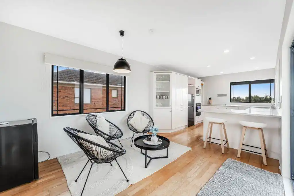 Zone for and 1.8 km to Macleans College, 4 beds 2.5 baths house with sea views on 1014m2 section, Currently operating as an Airbnb, 10 Beach Road, Mellons Bay, Auckland
