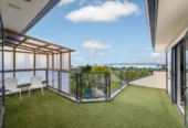 Zone for and 1.8 km to Macleans College, 4 beds 2.5 baths house with sea views on 1014m2 section, Currently operating as an Airbnb, 10 Beach Road, Mellons Bay, Auckland