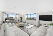 Zone for and 1.8 km to Macleans College, 4 beds 2.5 baths house with sea views on 1014m2 section, Currently operating as an Airbnb, 10 Beach Road, Mellons Bay, Auckland