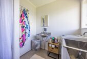 Once in 40 years, Current CV: $1,850,000, zoned for T/H’s and or Apartments, 4 x brick 2-bedroom units on 766m2 , each unit rented $390 per week, 25 Point England Road, Point England, Auckland