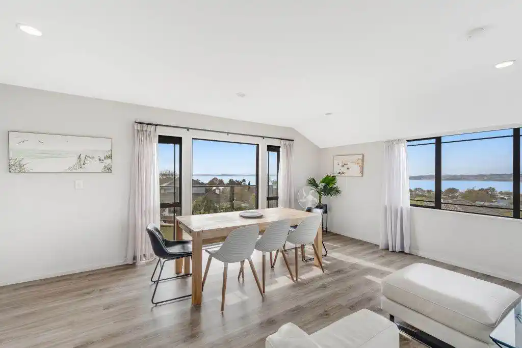Zone for and 1.8 km to Macleans College, 4 beds 2.5 baths house with sea views on 1014m2 section, Currently operating as an Airbnb, 10 Beach Road, Mellons Bay, Auckland
