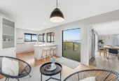Zone for and 1.8 km to Macleans College, 4 beds 2.5 baths house with sea views on 1014m2 section, Currently operating as an Airbnb, 10 Beach Road, Mellons Bay, Auckland