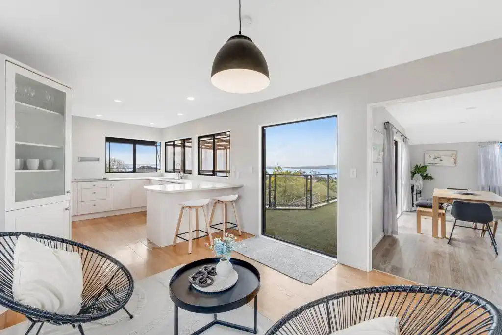 Zone for and 1.8 km to Macleans College, 4 beds 2.5 baths house with sea views on 1014m2 section, Currently operating as an Airbnb, 10 Beach Road, Mellons Bay, Auckland