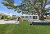 Move-in ready, renovated 3 beds 1 bath house with deck on 2709m2 section, 0.5 km to Tirimoana School, 1 km to Rangeview Intermediate, 1.8 km to Henderson High School, 107A Te Atatu Road, Te Atatu South, Auckland
