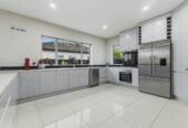 In Established Karaka Lakes community, 4 beds 2.5 baths house with double garage on 576m2 section, close to schools, shops, motorway access, 0.7 km to Hingaia Peninsula School, 1.1 km to Rosehill Intermediate, 1.2 km to Rosehill College, 41 Pickaberry Avenue, Karaka, Auckland