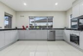 In Established Karaka Lakes community, 4 beds 2.5 baths house with double garage on 576m2 section, close to schools, shops, motorway access, 0.7 km to Hingaia Peninsula School, 1.1 km to Rosehill Intermediate, 1.2 km to Rosehill College, 41 Pickaberry Avenue, Karaka, Auckland