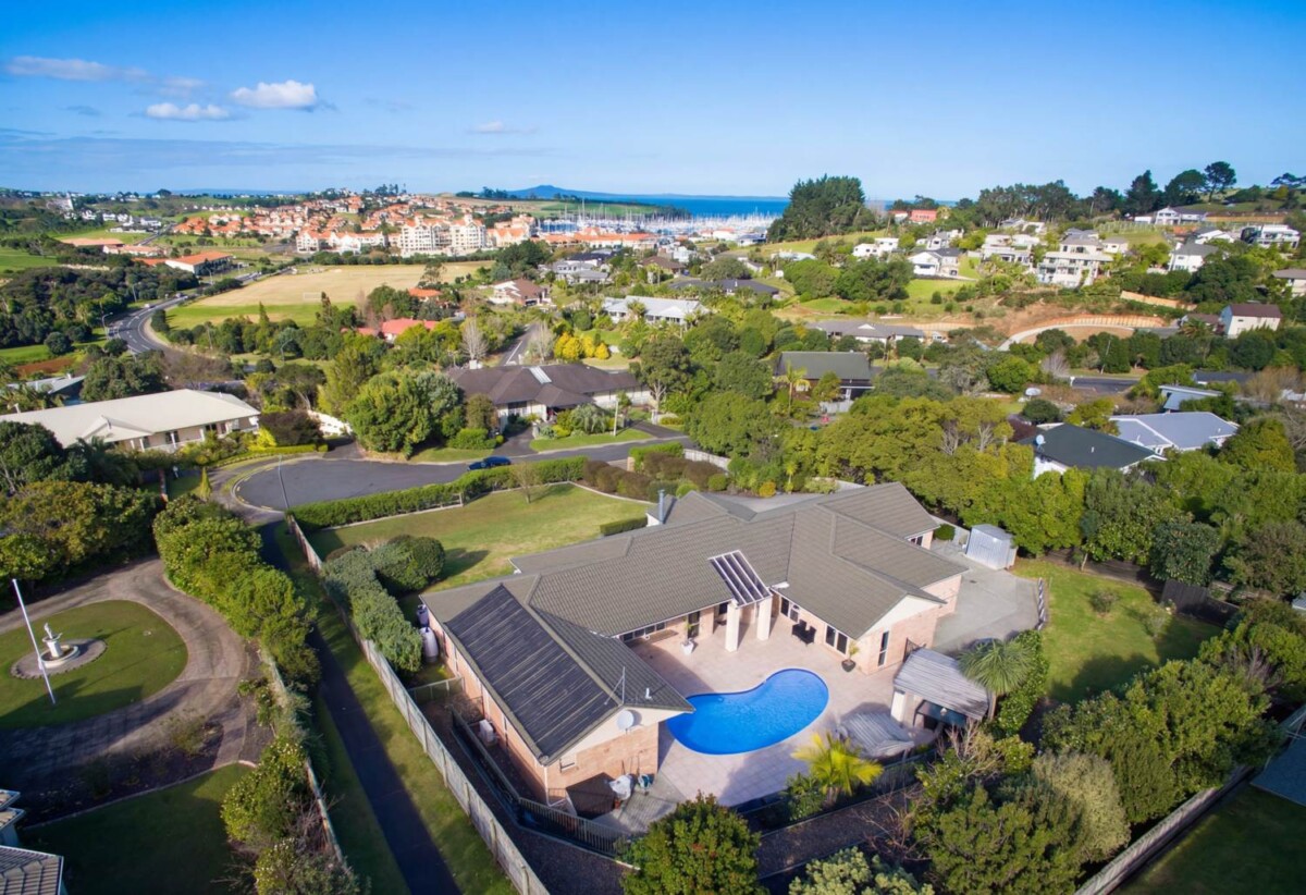 Brick and tile 4 beds 2.5 baths house with double garage and private swimming pool on 2129m2 section, 1.1 km to Gulf Harbour School, 15 Astrolabe Place, Gulf Harbour, Auckland