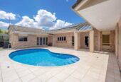Brick and tile 4 beds 2.5 baths house with double garage and private swimming pool on 2129m2 section, 1.1 km to Gulf Harbour School, 15 Astrolabe Place, Gulf Harbour, Auckland