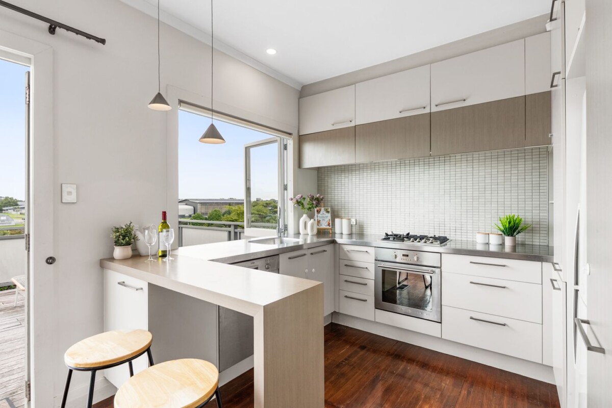 Owners now overseas, upgraded 3 beds 1.5 baths house with car park on 505m2 section, central heating , Set on an elevated site in one of Westmere’s most sought-after streets, sweeping views across Meola Reef and out to Seddon Fields, 22 Sunny Brae Crescent, Westmere, Auckland