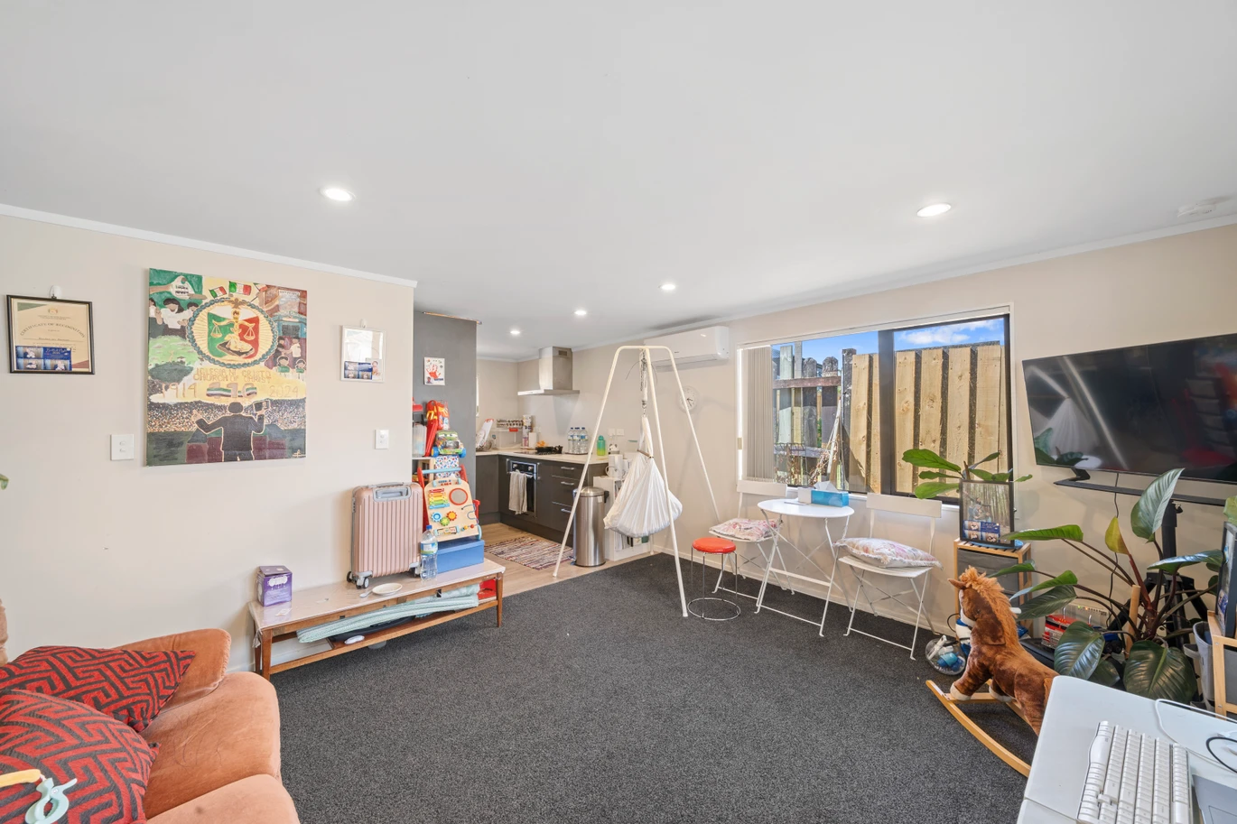 Home and income on 801m2 section, two separate three-bedroom dwellings on one title, each with its own driveway, currently rented for $1,030 per week, close to schools, golf club, shops, 18 Volante Avenue, Wattle Downs, Auckland