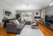 2 bed 1 bath house with garage on 809m2 section, The generous backyard provides plenty of room for kids to play, gardeners to potter, or future plans to unfold, 28 Norman Road, Titirangi, Auckland