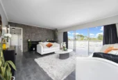 3 beds house on 766m2 section, Downstairs offers excellent additional space with a shower and two multi-purpose rooms, the Maungakiekie Golf Club is located on the same street, with shops, schools, and public transport all nearby, 13 Anita Avenue, Mount Roskill, Auckland