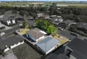 Home and income on 801m2 section, two separate three-bedroom dwellings on one title, each with its own driveway, currently rented for $1,030 per week, close to schools, golf club, shops, 18 Volante Avenue, Wattle Downs, Auckland