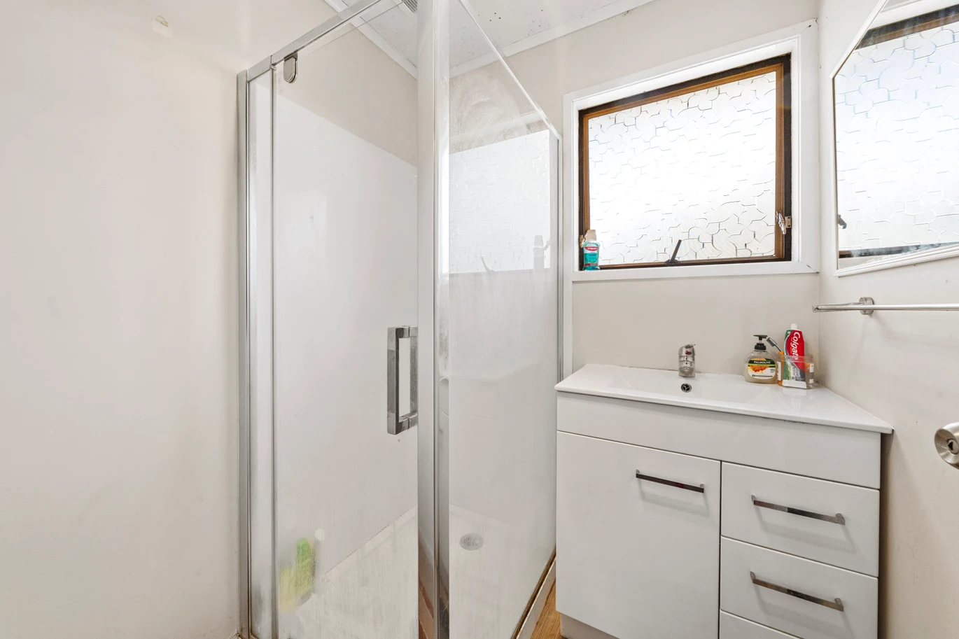 Home and income on 801m2 section, two separate three-bedroom dwellings on one title, each with its own driveway, currently rented for $1,030 per week, close to schools, golf club, shops, 18 Volante Avenue, Wattle Downs, Auckland