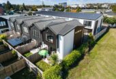 Bank Countdown On – This Must Be Sold within two weeks, 2 beds 1.5 baths home, backs directly onto the expansive Henderson High School playground, close to schools, shops, transport links, parks, and all the everyday essentials, 8/28 Smythe Road, Henderson, Auckland